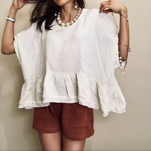 Brand New ruffle baggy shirt. Tag is S but fits like XL. Pit to pit is 27”